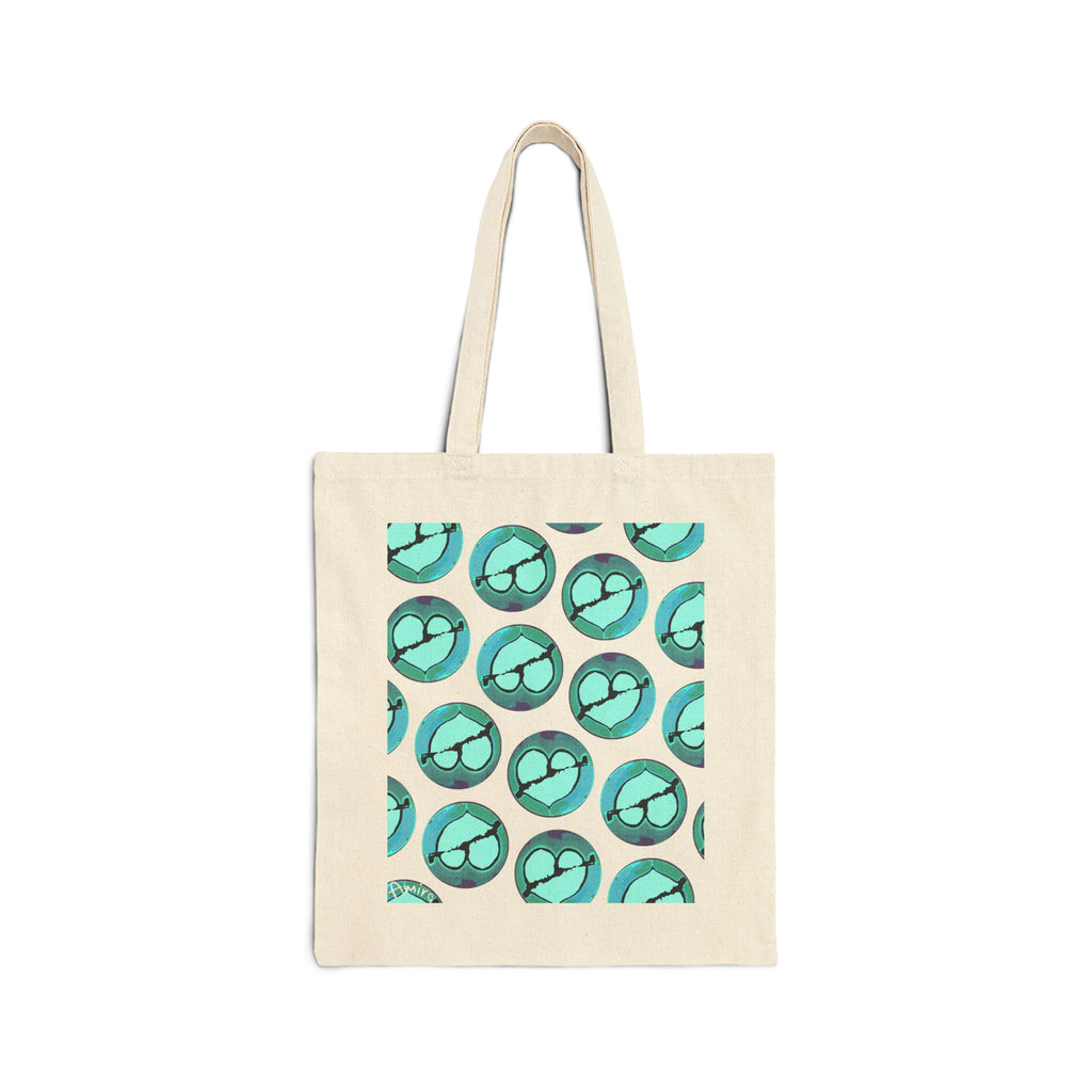 Latte art broken heart pattern on a neutral color cotton canvas tote bag. some hearts are rotated so that they look upside down.
Main colors: light blue / teal, some black