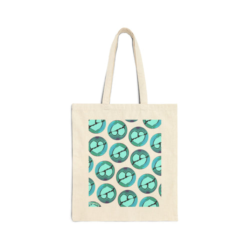 Latte art broken heart pattern on a neutral color cotton canvas tote bag. some hearts are rotated so that they look upside down.
Main colors: light blue / teal, some black