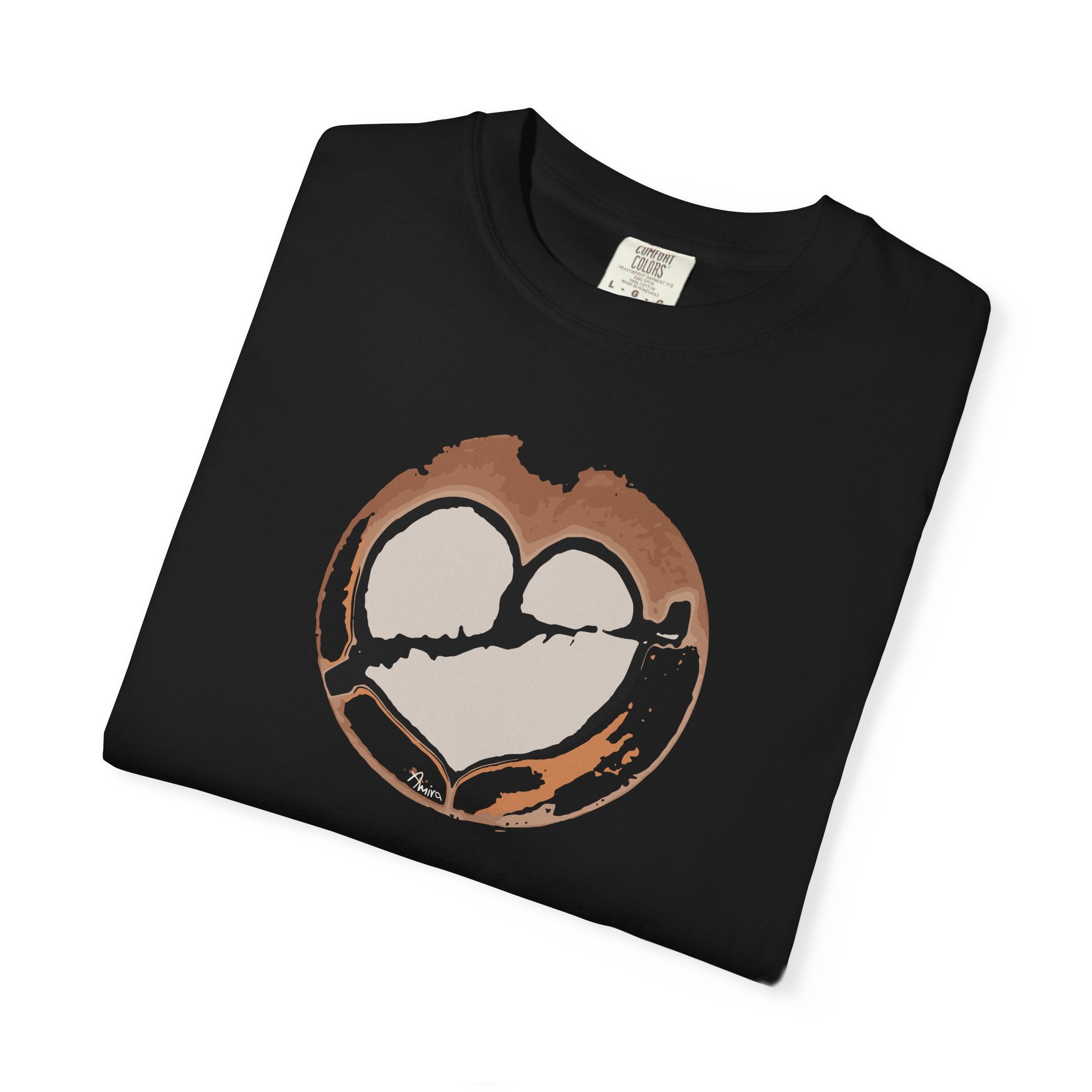 folded black t-shirt with a broken heart latte art print on its front side. Main colors: brown, gray, black (the arrow and part of the heart), orange.