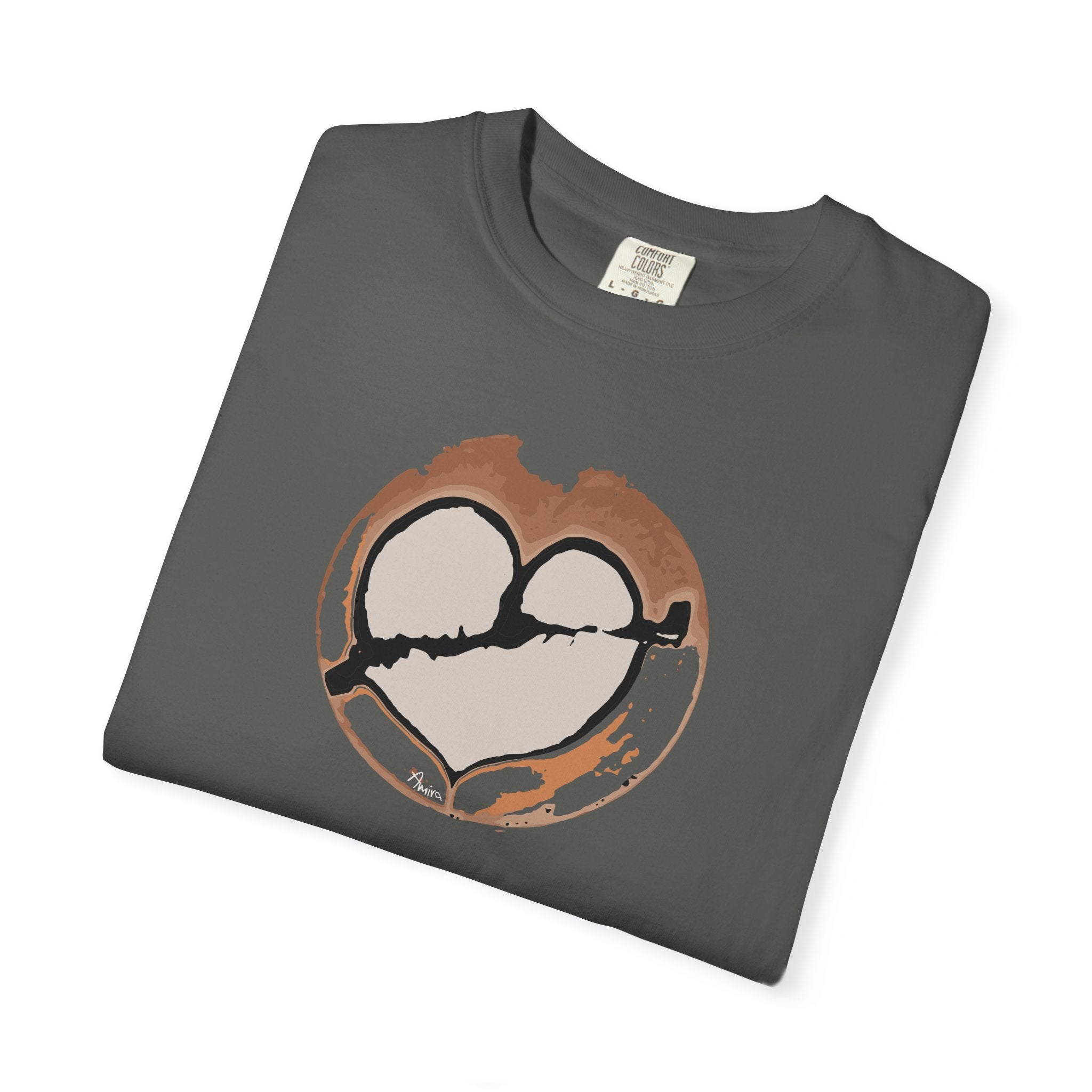 folded gray t-shirt with a broken heart latte art print on its front side. Main colors: brown, gray, black (the arrow and part of the heart), orange.
