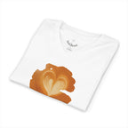 White v-neck t-shirt with a latte art print on its front side: a top view of latte art heart. Some parts of the brown foam look shredded. The shirt is folded, a branded neck label is visible
