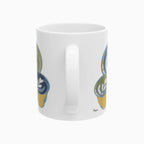 from this angle we see part of both sides' medium-sized and largest sized cups. My signature, on the bottom of the left side near the handle is also visible